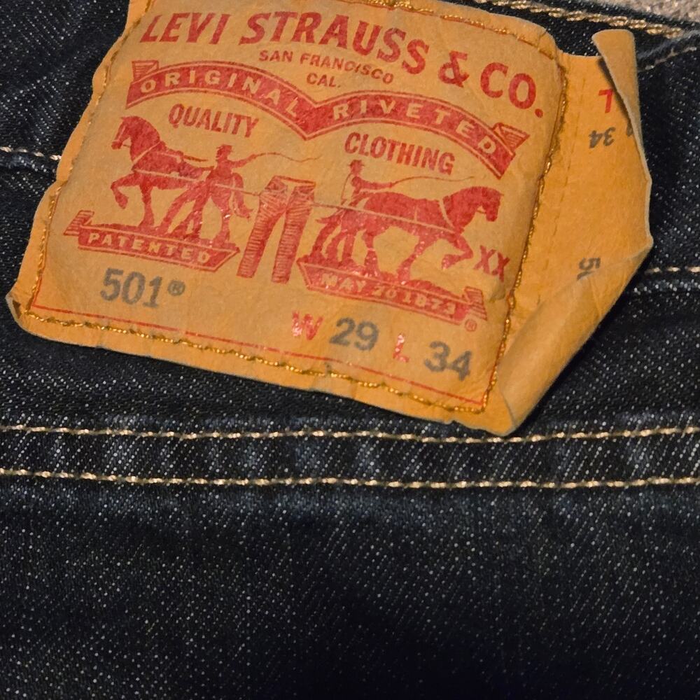 Levi's 501 Original Fit Jeans in a dark wash, specifically sized at W29 L34. - Picture 3 of 8
